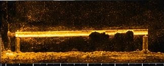 Acoustic image of a scraper element with partial loss of face